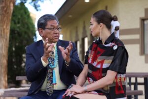 Alyssa London talking with Navajo President Russell Begaye